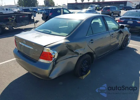 2005 Toyota Camry Le z USA, uszkodzony, nr VIN 4T1BE30K25U519656